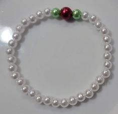 Christmas theme pearl bracelet Elegant Beaded Bracelets For Christmas Gift, Elegant Beaded Bracelets As Christmas Gifts, Festive White Pearl Bracelets, White Pearl Bracelets For Festive Occasions, Elegant White Christmas Bracelets, Elegant Adjustable Beaded Bracelets For Christmas, Festive Adjustable White Pearl Bracelet, Adjustable White Pearl Bracelet For Festive Occasions, Elegant White Bracelets For Holiday