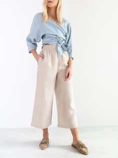 "RILEY is a wide leg cropped linen culottes. DETAILS - Cropped length - Seam pockets - Wide leg - Elasticated waist - 100% lightweight European linen fabric - Cut and sewn to order just for you in our studio COLOR - Beige, you can also choose other colors above - Fabric samples are available here https://www.etsy.com/listing/586569696/linen-fabric-samples SIZING & FIT - Fits true to size - Length is approximately 35.5 inches / 90 cm - Waist is approximately 13 inches / 33 cm - Inseam is appr Linen Pants For Women, Linen Culottes, Pants Linen, Studio Color, European Linens, Midi Dress Summer, Linen Trousers, Linen Women, Handmade Clothes