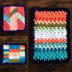 two crocheted coasters sitting on top of a wooden table