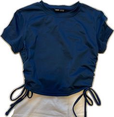 Trendy Navy Summer Tops, Navy Stretch Tops For Summer, Casual Drawstring Crop Top, Sporty Summer Tops With Drawstring, Fitted Short Sleeve Tops With Drawstring, Trendy Navy Stretch Top, Fitted Blue Top With Drawstring, Trendy Stretch Navy Top, Navy Stretch Trendy Top