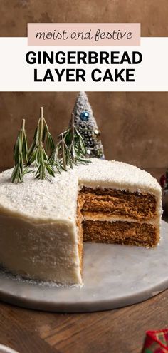 a gingerbread layer cake on a white plate with a slice cut out and topped with rosemary sprigs