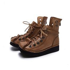 Casual Lace-up Boots With Metal Feet, Casual Martin Boots With Rivets And Round Toe, Brown Leather Combat Boots With Flat Heel, Winter Lace-up Boots With Rivets And Round Toe, Casual Platform Boots With Metal Feet, Vintage Leather Martin Boots With Round Toe, Winter Leather Lace-up Boots With Rivets, Casual High-top Boots With Rivets, Casual High-top Boots With Metal Feet