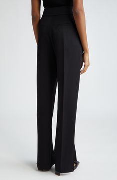 Crisp creases further the polished look of these high-waisted wool straight-leg pants designed with long slits at the hems. 34 1/2" inseam; 17" leg opening; 13 3/4" front rise; 16 1/2" back rise (size 42 FR) Zip fly with hook-and-bar closure Front slant pockets; back welt pockets 100% wool Dry clean Made in Bulgaria Designer Clothing Designer Clothing Brands, How To Hem Pants, Pants Design, Wool Pants, Tailored Trousers, Split Hem, Polished Look, Straight Leg Pants, Welt Pockets