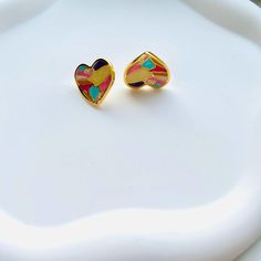 Embrace the language of love with our enchanting Colorful Geometric Heart Stud Earrings. These earrings feature a unique design that will make you stand out from the crowd. Their lightweight and comfortable design make them perfect for all-day wear. Show off your fun and vibrant personality with these stylish and colorful earrings. Material: Copper, 925 silver needle Geometric Heart, Colorful Earrings, Heart Studs, Heart Earrings Studs, 925 Silver, Copper, Unique Designs, Stud Earrings, Make It Yourself