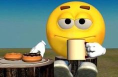 a yellow smiley face sitting on top of a tree stump holding a coffee cup and doughnuts