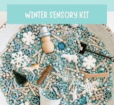 an image of a snowflake with the words winter sensory kit on it