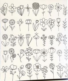 a notebook with flowers drawn on it and some writing in black ink next to each other