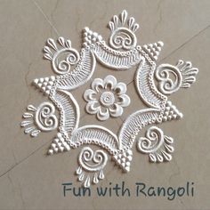 an intricately designed design on the floor with words fun with rangoli written below