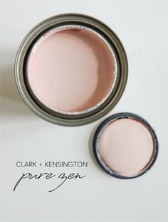 two pink paint cans with the words clark and kensingtonton pure ger