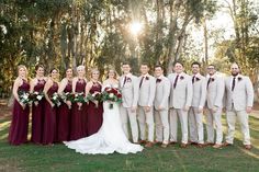 a bride and groom with their bridal party