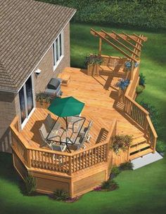 an aerial view of a wooden deck and patio