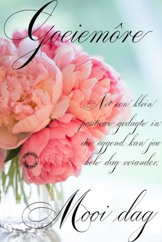 a vase filled with pink peonies on top of a table next to a quote