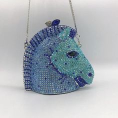 Horse Head Diamond Inlaid Dinner Bag Jewel Bag Banquet Product Details: Product category: dinner bag Material: alloy Applicable scenario: daily collocation Fabric texture: PU Luggage trend style: jewel bag Internal structure of bag: certificate bag Color: blue color Pattern: Horse Head Size: 14 * 12 * 8 cm Package content: Dinner bag X1 Luxury Blue Bag As Fashion Accessory, Luxury Blue Stylish Bag, Luxury Blue Shoulder Bag For Gift, Luxury Blue Bag, Luxury Blue Pouch Clutch, Blue Rhinestone Evening Bag, Blue Rhinestone Evening Bag For Party, Elegant Light Blue Bags For Party, Elegant Light Blue Party Bags