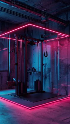 an empty gym room with neon lights and equipment on the floor in front of it