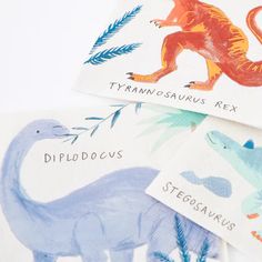 three dinosaur themed napkins on top of each other with the words tyranosasauruss next to them