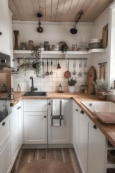 the kitchen is clean and ready for us to use it's counters are white