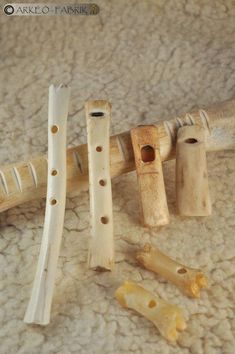 several pieces of wood sitting on top of a carpet