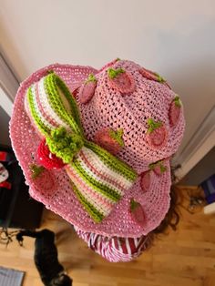 "A handmade crochet beanie hat with a folded brim, made of soft yarn. The hat has a textured pattern of alternating stitches and a pom-pom on top. Red Crochet Hat, Crochet Increase, Strawberry Hat, Crochet Green, Crochet Strawberry, Confection Au Crochet, Crochet Decrease, Crochet Design Pattern, Kawaii Crochet