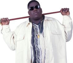 a man with sunglasses on his head holding a stick in front of his face while standing against a white background