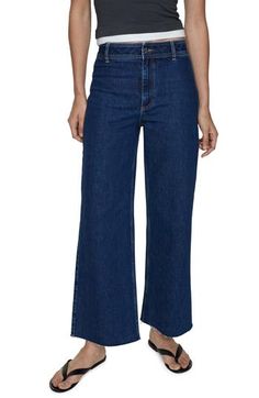 Inspired by retro culottes, these wide-leg jeans feature a flat-front waist, raw hems and dark-wash, low-stretch denim with minimal fading. Zip fly with button closure Back patch pockets 99% cotton, 1% elastane Machine wash, line dry Imported Casual Flare Cropped Jeans For Work, Flared Cropped Jeans For Workwear, Dark Wash Wide Leg Cropped Jeans For Work, Wide Leg Cropped Jeans In Dark Wash For Work, Denim Blue Flare Bottoms For Work, Wide-leg Cropped Denim Jeans For Work, Wide-leg Cropped Jeans For Work, Wide Leg Cropped Jeans For Work, Summer Flare Jeans For Workwear