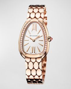 Find BVLGARI Serpenti Seduttori 18k Rose Gold 33mm Watch With Bracelet on Editorialist. Serpenti Seduttori bracelet watch from BVLGARI Approx. 33mm case in 18karat rose gold Scalylink bracelet with pin buckle closure Silvertone dial with white diamond bezel Baton and Roman numeral indices 0.38 total diamond carat weight Twohand quartz movement Water resistant to 3 ATM Sapphire crystal window Made in Switzerland Rose Gold Diamond Bracelet, Golden Watch, Bulgari Jewelry, Bvlgari Serpenti, Latest Watches, Bracelets Gold Diamond, Rose Gold Watches, Roman Numeral, Diamond Carat