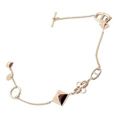 About This Piece: Metal: 18k Rose Gold  Length:  Total: 7.75"  Toggles to fit wrist size: 6.5"  Weight: Width: 8.7 grams  Motif Widest Size: 12mm  Hallmarks: HERMES 120407 AU750 1979VI French Assay Marks   Please refer to the dimensions in the description above for accurate measurements. Please reach out to the seller with any questions on dimensions or fit prior to purchase. Luxury Metal Bracelets With Plating, Designer Yellow Gold Metal Bracelets, Luxury Rose Gold Chain Bracelet For Formal Occasions, Timeless Rose Gold Metal Bracelet, Formal Rose Gold Metal Chain Bracelet, Luxury Rose Gold Tarnish-resistant Bracelet, Formal Rose Gold Chain Bracelet, Luxury Metal Bracelets, Rose Gold Metal Bracelet With Polished Finish