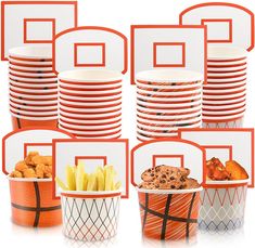 an assortment of basketball themed party supplies including paper plates, cups, and napkins