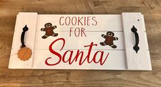 a wooden sign that says cookies for santa