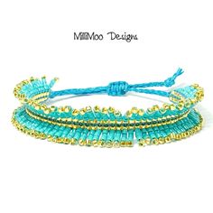 the beaded bracelet is made with turquoise and gold beads