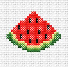 a watermelon cross stitched on to a white background