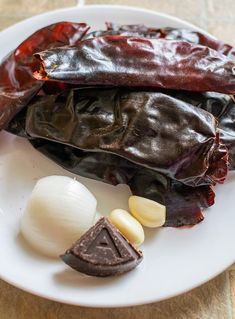 an assortment of food on a plate with some sort of wrapper next to it