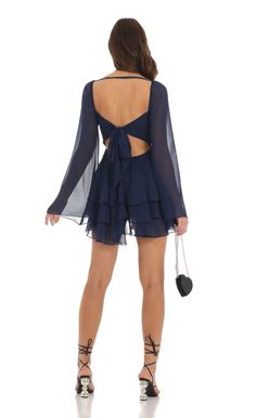 Chiffon Bell Sleeve Dress in Navy | LUCY IN THE SKY Flowy Chiffon Dress For Night Out, Chiffon Mini Dress With Tie Back, Chiffon Party Dress With Back Zipper, Party Dress With Back Zipper In Chiffon, Ruffled Georgette Chiffon Dress For Party, Backless Chiffon Mini Dress With Ruffles, Chiffon Tie-back Dress For Date Night, Flowy Chiffon Dress For Date Night, Ruffled Chiffon Dress For Night Out