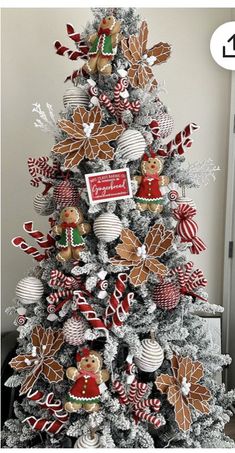 a christmas tree decorated with gingerbread cookies