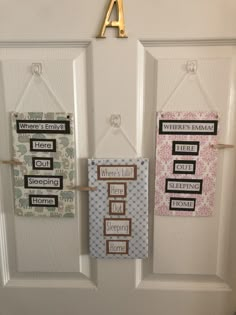 three door hangers with words on them hanging from the side of a white door