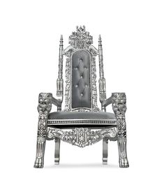 an elaborately designed chair with two lions on it's armrests and legs