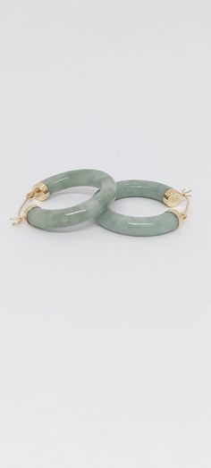 GREEN Jade Hoop 14k Yellow Gold Earrings / Natural Color Grade A Green Jade Hoop Earrings / Jade Hoop Earrings 14K yellow Gold. Product Info: -Earring Dimensions: 23mm x 23mm -Metal: 14k -Stone: Natural color Grade A Green Jade. -Colors: Green. -Finish: Yellow gold. -Nice Gift box is included. Donuts Earrings, Jade Charm, Yellow Gold Earrings, Jade Earrings, Loop Earrings, Jade Ring, Charm Pendant Necklace, Colors Green, Beaded Hoop Earrings