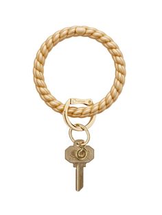 It’s the silicone Big O you know and love but with one fabulous twist… or shall we say, braid! Months in the making, the Braided Silicone Big O Key Ring flaunts a jewelry-inspired shape yet is molded from the same life-proof, non-toxic silicone we’ve all come to depend on. Inspired by timeless, woven textures, the Braided Big O functions like a key ring while looking like a chic, bangle bracelet. The Original Big O Key Ring is a one-size-fits-all bracelet key ring that can be worn on your forear Big O, Silicone Bracelets, Tickled Pink, Gold Rush, Key Ring, Key Rings, Bangle Bracelet, Pink And Gold, Rush