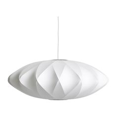 a white light hanging from the ceiling with an abstract design on it's side