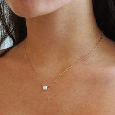 The epitome of classic, the Margot necklace (French for pearl) is a timeless piece to wear on special occasions or for an everyday polished look. Each purchase comes with an elegant, vegan leather box for storing + caring for your jewelry. DETAILS14k Solid Gold | Pearl measures 1/2 mmAvailable in 14", 16" or 18" Classic 14k Gold Pearl Necklace, Classic Akoya Pearl Clavicle Chain Necklace, Classic Round Pearl Necklace With Delicate Chain, 14k Gold Delicate Chain Pearl Necklace For Weddings, Minimalist Akoya Pearl Round Necklace, Minimalist Akoya Pearl Necklace, 14k White Gold Necklaces With Pearl Drop, Classic 14k Gold Necklace With Pearl Charm, Timeless Pearl Necklace With Clavicle Chain For Formal Occasions