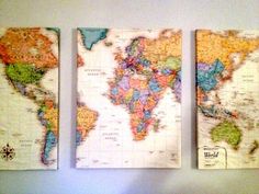 three maps are hanging on the wall