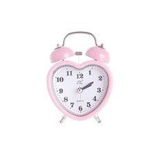 a pink alarm clock with two bells on the front and back of it's face