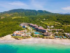 an aerial view of the resort and surrounding area