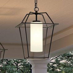 an outdoor light fixture hanging from the ceiling