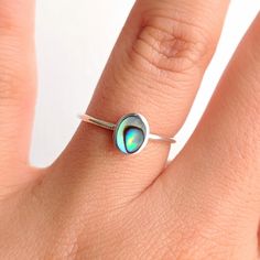 "\"Misty\" ♀️ 925 sterling silver dainty abalone shell ring ♀️ 925 sterling silver tiny abalone studs ♀️ Ring height: 7mm ♀️ Studs height: 7mm ♀️ Nickel free ♀️ Free domestic shipping \"I just try to approach every opportunity on stage as if it's my first time and my last time.\" - Misty Copeland" Iridescent Sterling Silver Crystal Promise Ring, Iridescent Sterling Silver Rings For Gifts, Minimalist Sterling Silver Opal Ring, Handmade Dainty Sterling Silver Opal Ring, Iridescent Sterling Silver Promise Ring, Dainty Handmade Silver Opal Ring, Dainty Silver Opal Stackable Ring, Handmade Iridescent Sterling Silver Ring, Dainty Silver Stackable Opal Ring