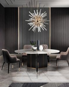 an elegant dining room with black and white walls, grey upholstered chairs and a chandelier