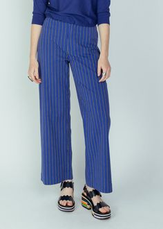 Bellerose's Lottie Trouser is crafted of a cotton blend and features a high waist, fitted hip and wide leg. Details: Zip and single button closure. High waisted. Fitted hip. Wide leg. Minimal front pockets. Rear pockets. Belt loops. Machine wash cool. Line dry. Dry clean. Made in Europe. Color blue stripe. 62% cotton, 37% viscose, 1% elastane. Seychelles, British Indian, Mozambique, Sale Design, Brunei, Blue Stripes, Casual Pants, New Dress, Knitwear