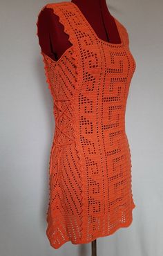 Crochet summer tunic or  beach crochet tunic  The orange tunic dress is crocheted from cotton yarn. Soft and fine natural yarn. Lovely crochet orange tunic for summer and beach. This lace cover-up has a straight style. The crochet cover-up has ties on both sides.  This beach dress mini is ideal for hot summer.  Size - S (UK 8-10, EURO 36-38).  Dummy dimensions on a photo: bust - 88 cm (34 inches), waist - 70 cm (27 inches) Hand wash in cold water, not wring out, and lay out to dry. Prepared to s Fitted Orange Crochet Top For Summer, Handmade Sleeveless Crochet Dress For Summer, Orange Summer Crochet Top, Handmade Sleeveless Crochet Summer Dress, Orange Crochet Beach Top For Spring, Orange Crochet Top For Beach And Spring, Orange Crochet Dress For Vacation, Summer Orange Crochet Top, Orange Crochet Beach Dress For Summer