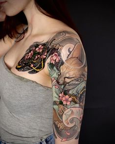 a woman with a tattoo on her arm