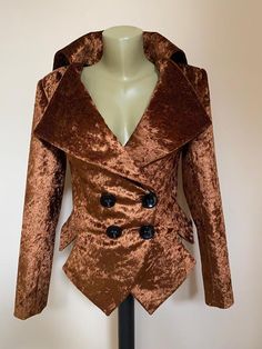 This is a very stylish and elegant jacket . Leght  58cm - at back. Fully lined. A jacket especially made to turn heads and give you that wow factor :)SIZE CHARTSIZE S - US 6, UK 8, EU 36bust: bust around 34.5”/90cmWaist: waist around 27.5”/70cmHips: hips around 34.5”/90cmSIZE M - US 8, UK 10, EU 38bust: bust around 37.5”/95cmWaist: waist around 29.5”/75cmHips: hips around 37.5”/95cmSIZE L - US 10, UK 12, EU 40bust: bust around 39.5"/100cmWaist: waist around 31.5”/80cmHips: hips around 39.5”/100c Gold Velvet Tuxedo Jacket, Fall Party Outerwear With Suit Collar, Tailored Party Blazer With Buttons, Gold Fitted Blazer With Lapel Collar, Tailored Double-breasted Party Blazer, Fitted Brown Double-breasted Blazer, Party Outerwear With Double Button Closure And Lapel Collar, Party Blazer With Lapel Collar And Buttons, Party Blazer With Suit Collar And Buttons