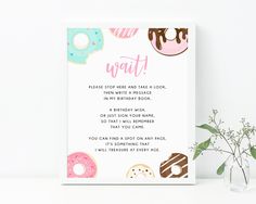 a card with donuts on it that says wait